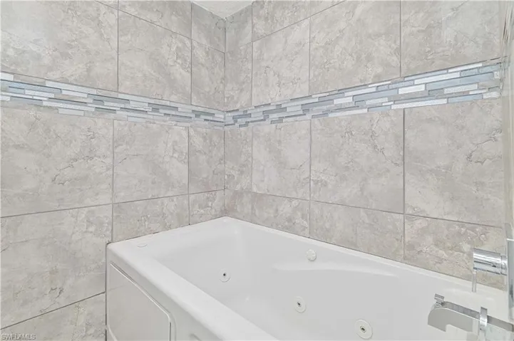 Bathroom featuring a jetted tub