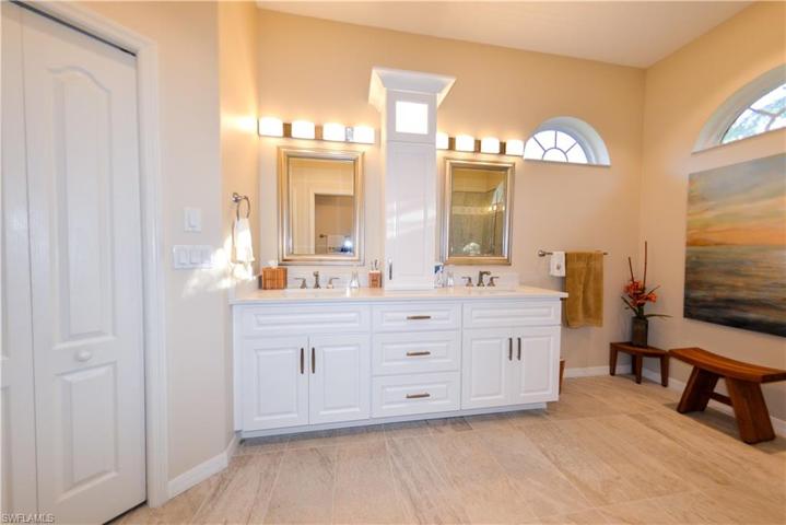Updated Primary bath with wood cabinets