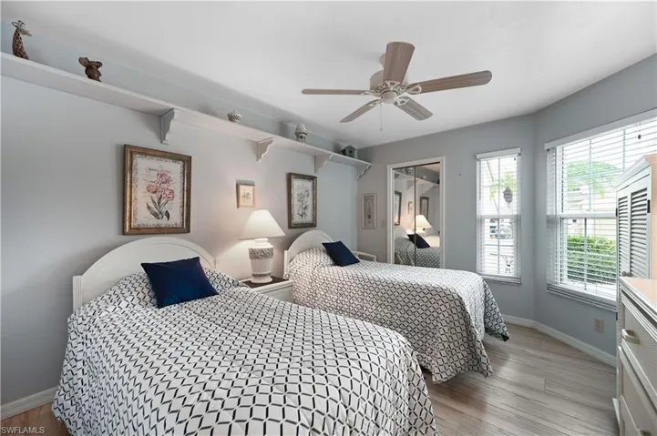 2nd Bedroom with light wood-style floors and a ceiling fan