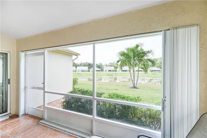 Partial view from Sun Room featuring a water view and healthy amount of natural light