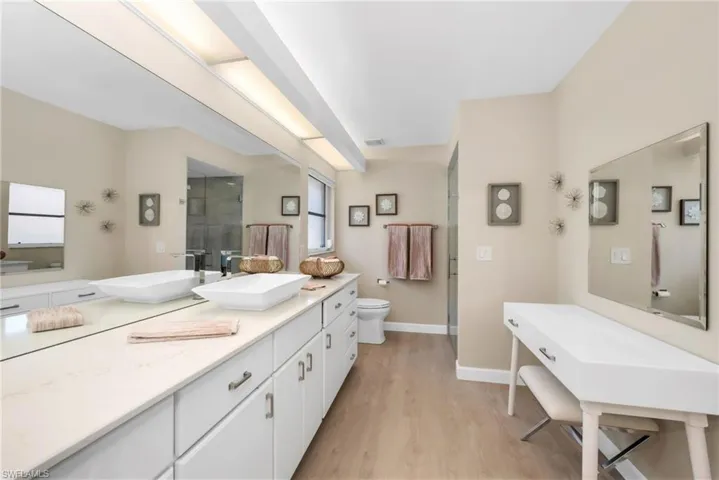 Spacious and stylish, with a walk-in shower, and generous counter space.