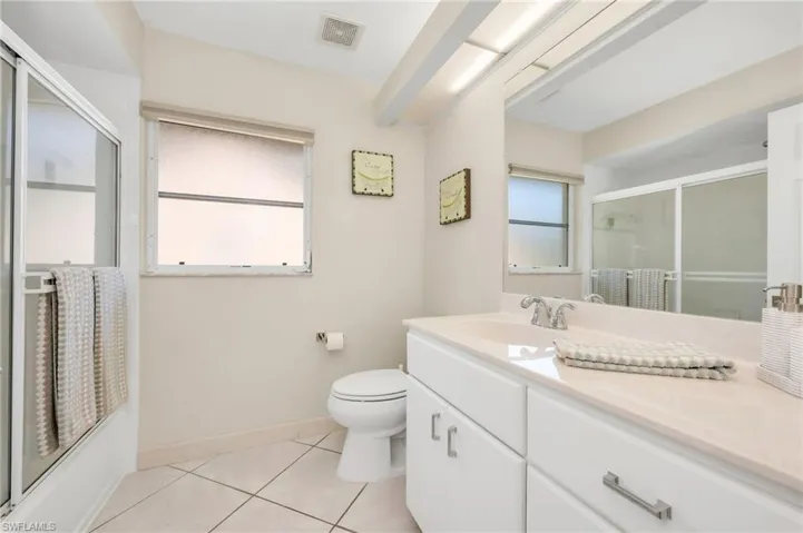 Immaculate and functional guest bathroom, offering ample space and quality finishes.