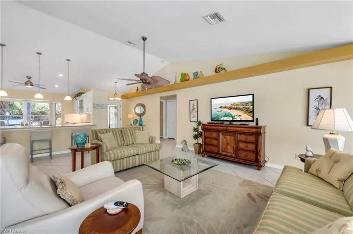 Comfort meets style in this beautifully designed great room, ideal for entertaining or cozy nights in.