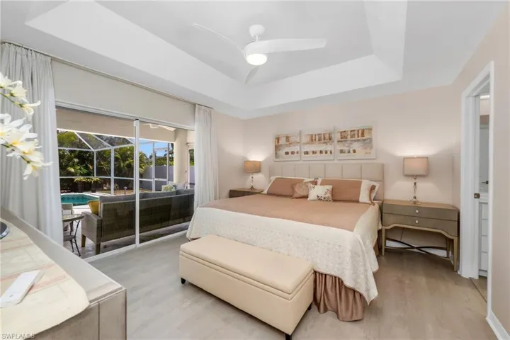 Retreat to your spacious primary suite featuring sliding glass doors and lanai access.