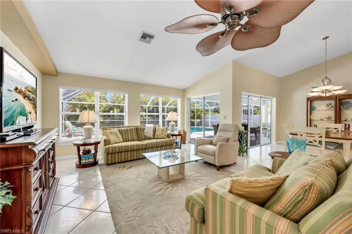Bright and airy living space with abundant natural light, open to the kitchen and dining areas.