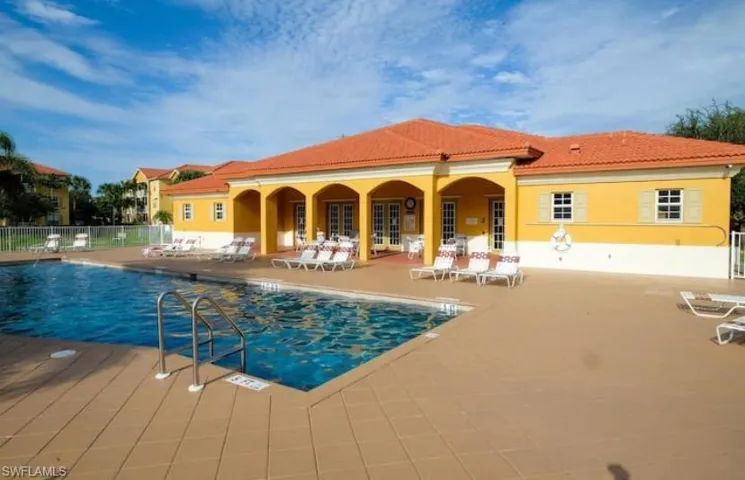 View of swimming pool with a patio