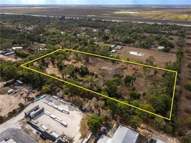 Aerial overview of property's location with property parcel outlined