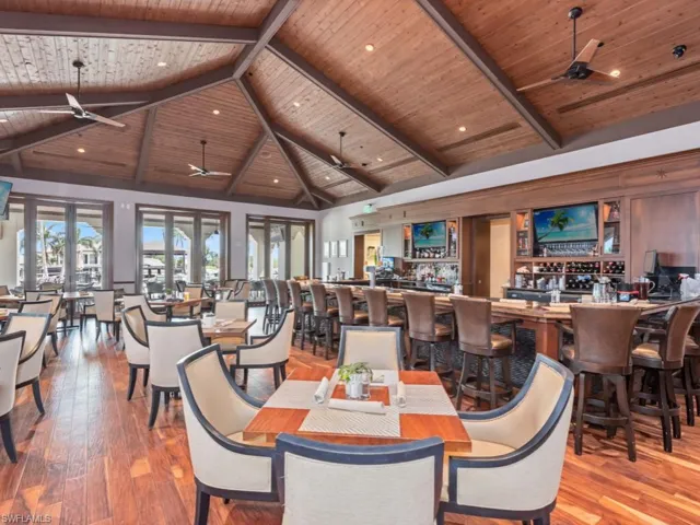 Vyne House Dining room Sliders To Pool/Outside Dining featuring beamed ceiling,