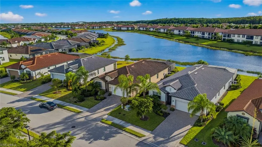 Aerial view of residential area with a large body of water