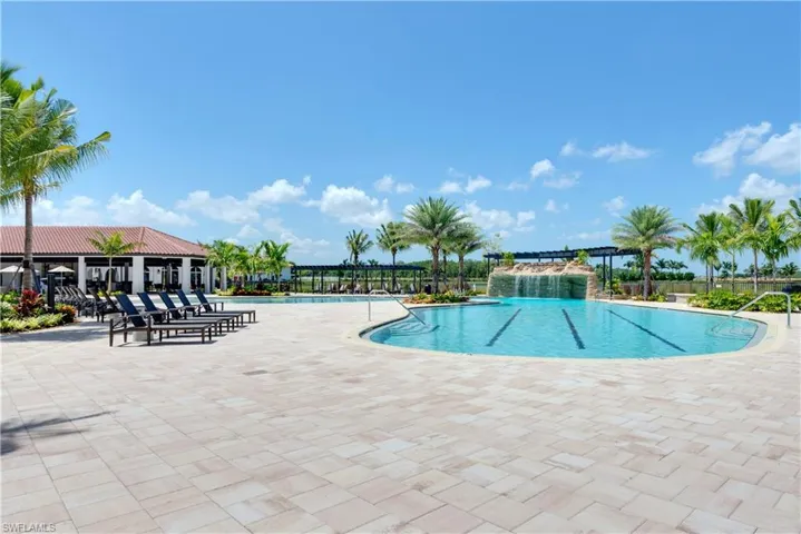 Community pool featuring a patio area
