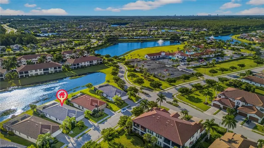 Aerial view of residential area with a large body of water