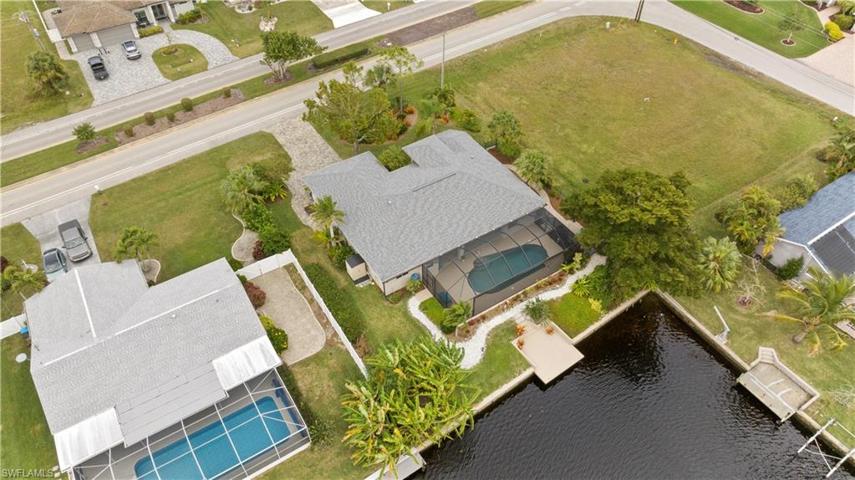 Aerial View of this oversized double lot. New Shingled Roof in 2020.