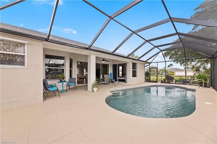 Expansive Pool Deck under New Screened Cage