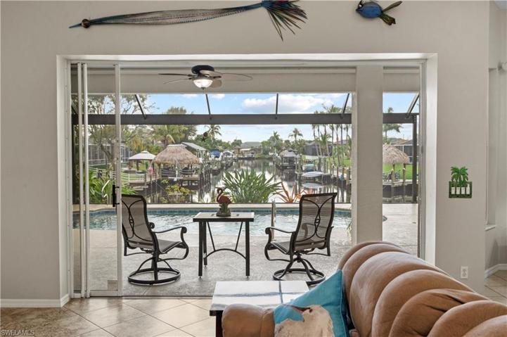 Great Room overlookingi the Lanai, Pool and southern view down the Hudson Canal.