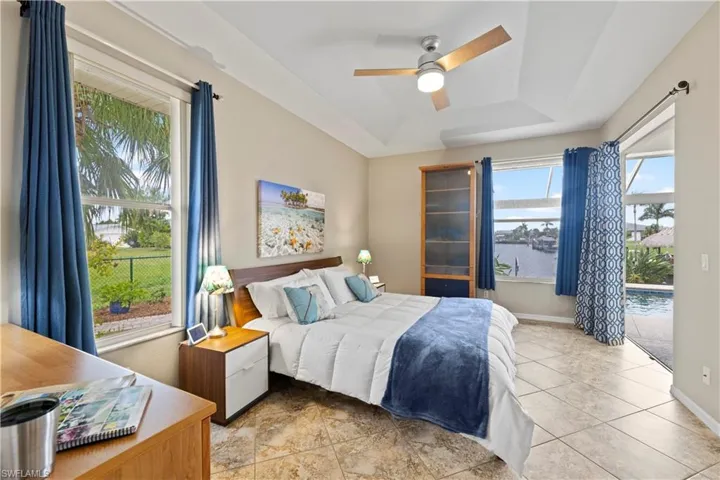 Lots of natural light 2 large windows and double panel sliders to Lanai.