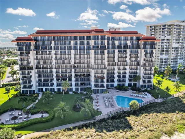 View of property featuring a community pool