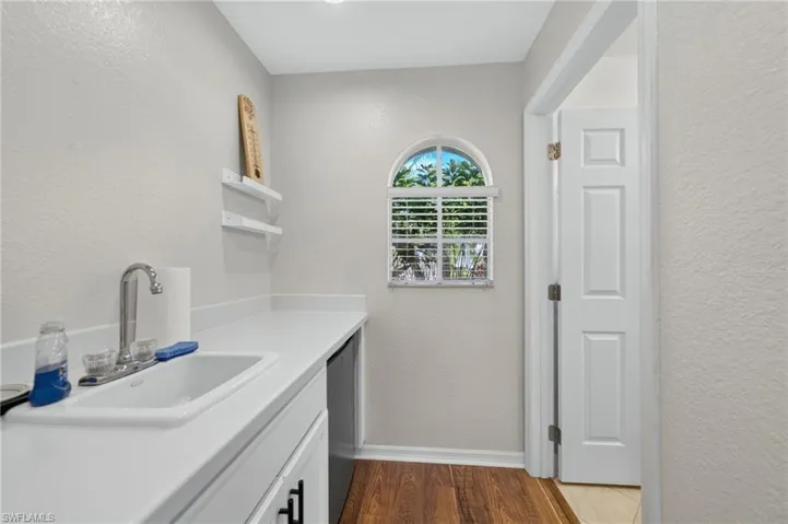 Casita kitchenette area leading to private guest full bath