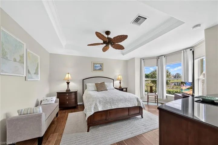 Primary Bedroom with real wood floors