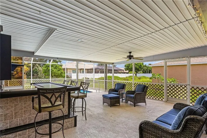 View of patio with ceiling fan