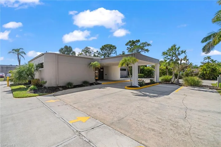 View of front of house featuring a carport