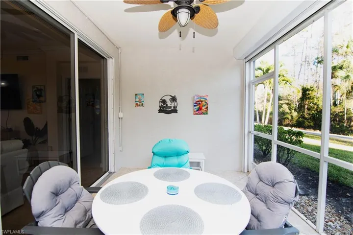 Large tiled and fully screened lanai with direct access to the outdoors; motorized storm shutters; a ceiling fan and a table with 4 comfortable chairs.