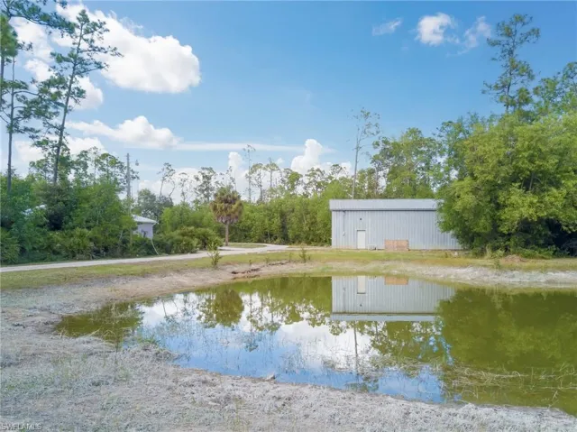 Water view with an outbuilding