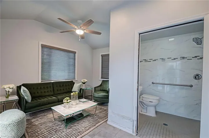 This Bonus room /Casita is off the pool and features an Full ADA Bathroom.
