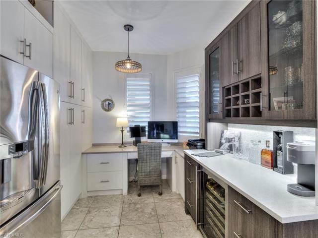 Custom cupboards, wine cooler & work desk