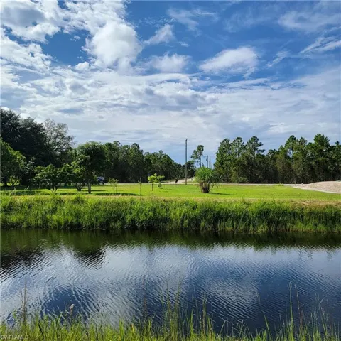 Water view-  rear view directly across the  canal from the back of the lot