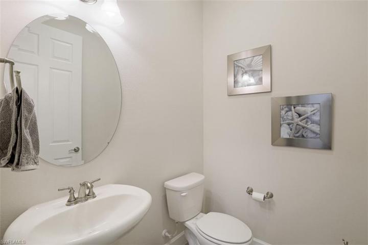 Half bath located just off the den.