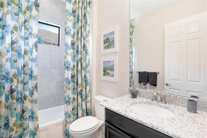 Guest Bath has lots of natural light and a linen closet for extra storage.