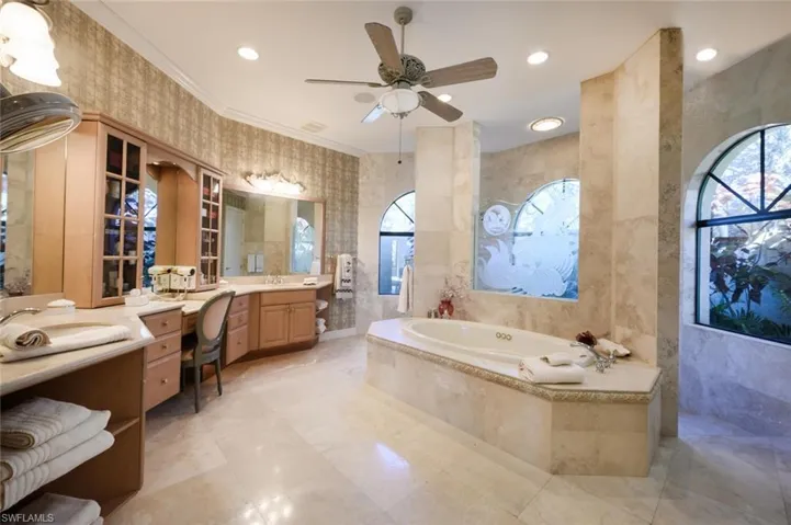 Primary Bathroom with a shower accessible from both sides