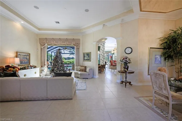 You are welcomed with the pool, lake and golf course view when you walk in the front door!