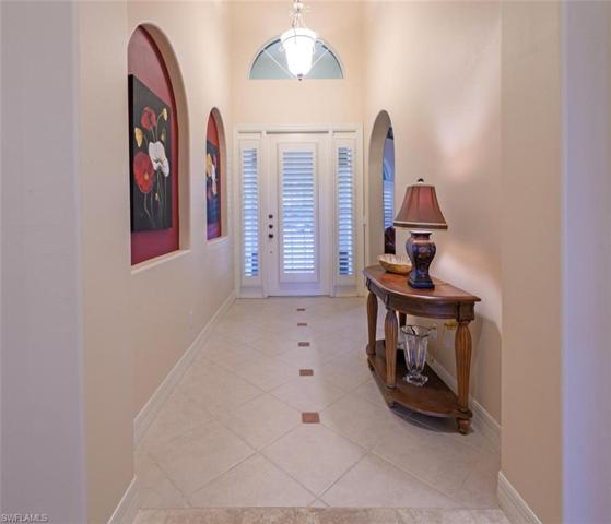 Entry Way with High Ceilings and Designer Lighting
