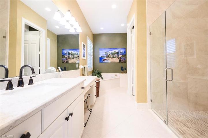 Master Bathroom with  Walk in Tile Shower, Separate Tub area and Large Walk in closet