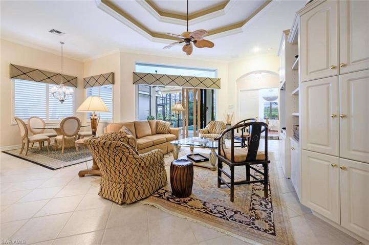 Living room with High Double Trey Ceilings