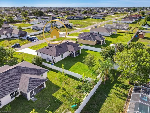 Aerial perspective showcasing a residential neighborhood with single-story homes
