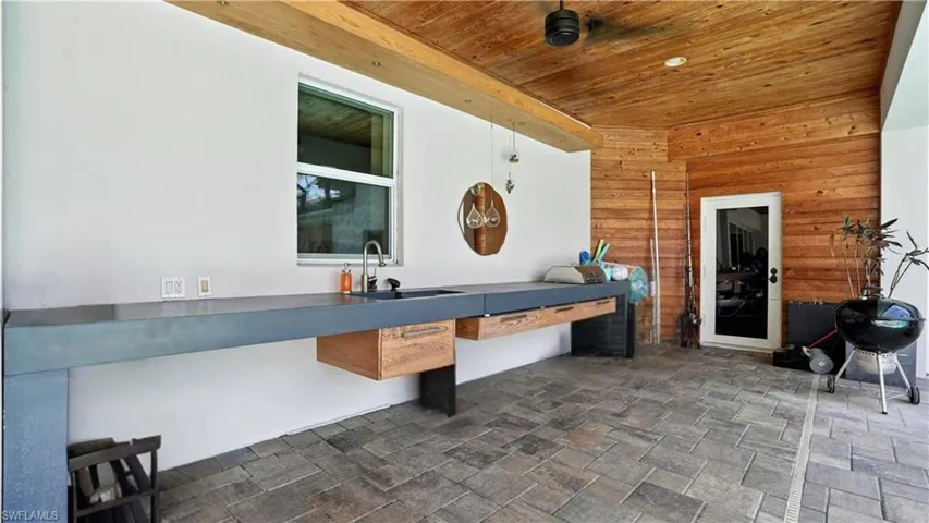 View of patio featuring a sink - Virtually Edited Image