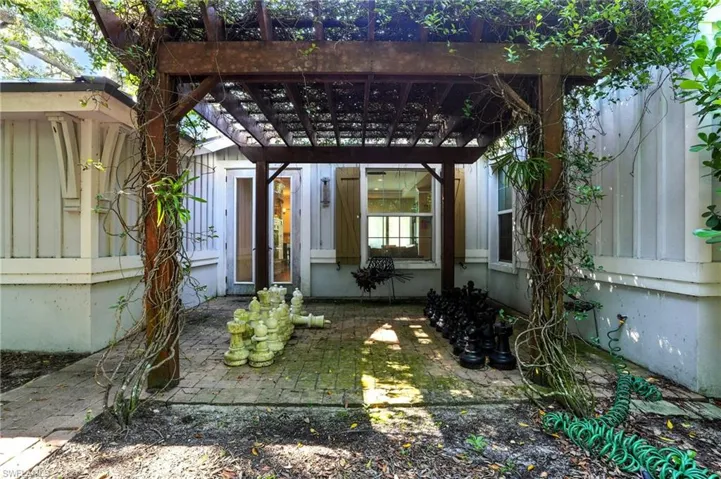 View of patio / terrace with a pergola - Virtually Edited Image