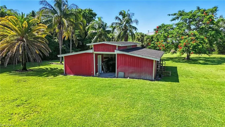 View of pole building with a lawn - Virtually Edited Image