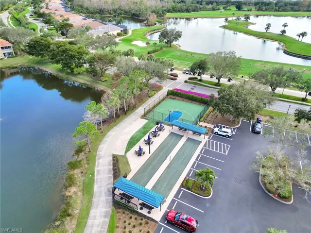Aerial View of the Bocce Courts, Basketball Court, Golf Course, & Lake