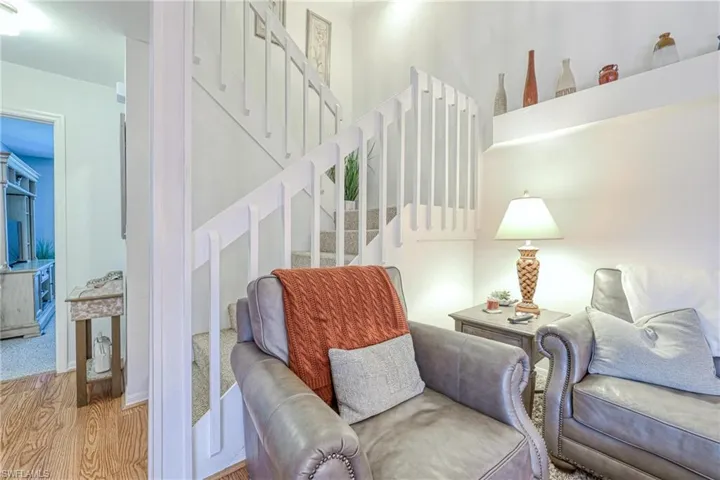 Living room with light wood-type flooring