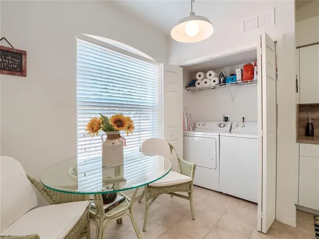 Dining area featuring washer and dryer