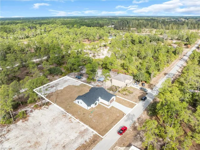 Drone / aerial view of a heavily wooded area