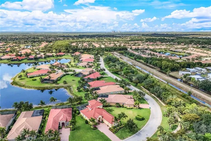 Birds eye view of property featuring a residential view and a water view