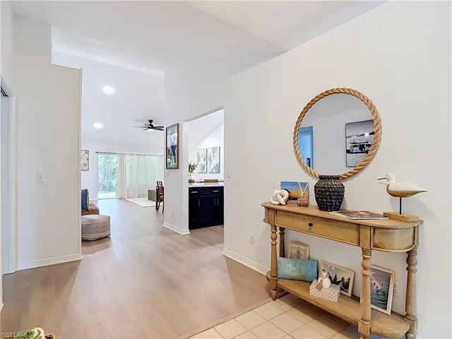 Vaulted ceilings and recessed lighting illuminate the interior