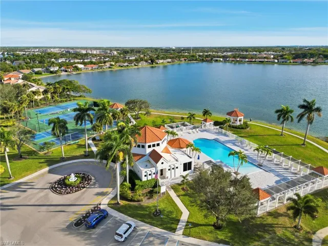 Aerial view of a large body of water and a pool area