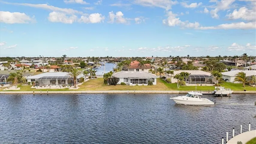 Water view with nearby suburban area