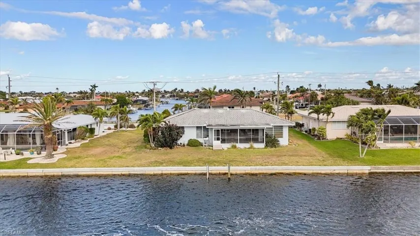 Water view with nearby suburban area