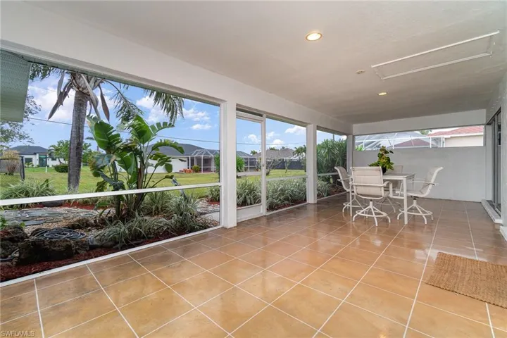 Unfurnished sunroom featuring plenty of natural light